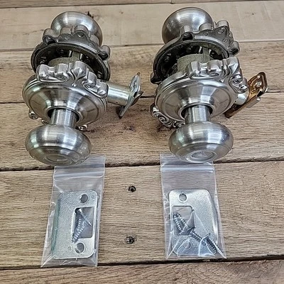 Perilla de puerta Schlage F40 GEO 619 BRK usada con moldura Brookshire sin bloqueo 2 juegos Foto 1 de 4