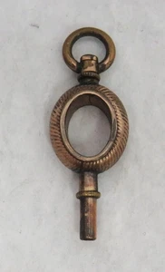 ANTIGUA LLAVE RELOJ BOLSILLO BRONCE RARA - Imagen 1 de 4