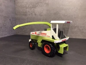 SIKU Mähdrescher CLAAS (Mähwerk abgebrochen, lenkachse defekt) - Bild 1 von 4