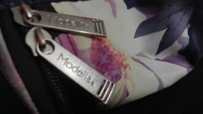 MODELLA 11"x5 3/4"x5 1/4" LARGE COSMETIC BAG BLACK BACKGROUND W/FLORAL PRINT - Image 1 of 4