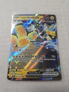 Iron Hands ex 031/131 Sv: Prismatic Evolutions Holo - Bild 1 von 2