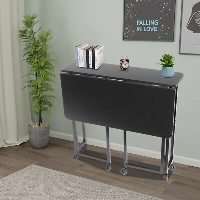 Mesa Plegable Negra con Ruedas - Diseño Elegante y Multifuncional Foto 1 de 4
