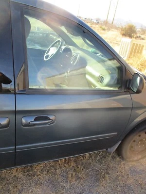 Dodge Caravan 2006 pasajero puerta delantera derecha carcasa Foto 1 de 3