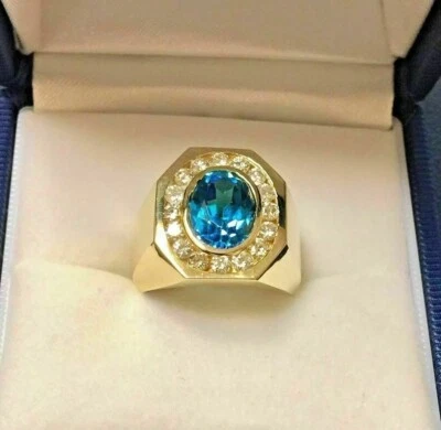Обручальное кольцо с ореолом мужское с имитацией голубого топаза овальной огранки 2 карата покрытие желтым золотом 14 карат - Изображение 1 из 4