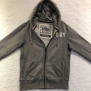 Superdry Classic Union Workwear Supplies Sudadera con Capucha Cremallera Completa Hombre Talla Mediana Gris - Imagen 1 de 19