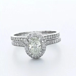 Juego de anillos de compromiso de oro de 14 quilates bajo halo diamante ovalado cultivado en laboratorio de 2,15 quilates H VS1 - Imagen 1 de 5