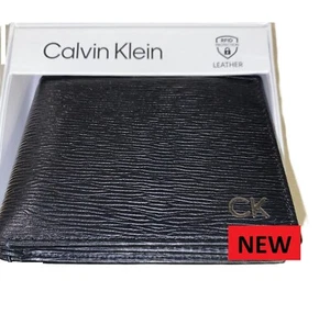 CARTERA DE CUERO CALVIN KLEIN 31KA130003 NEGRA DOBLE PLIEGUE PARA HOMBRE NUEVA ENVÍO AL REINO UNIDO - Imagen 1 de 5