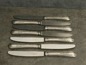 Série de 7 Grands Couteaux de Table en Métal Argenté  Orf. Frionnet Anciens