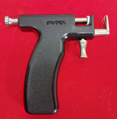 Pistola de perforación de oreja Studex instrumento herramienta de perforación de oreja negra Foto 1 de 4