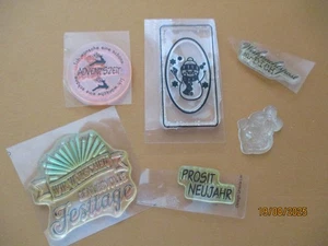 6 Silikonstempel: Schriften und Schneemann im Rahmen sowie kleine Glocke, gebr. - Bild 1 von 13