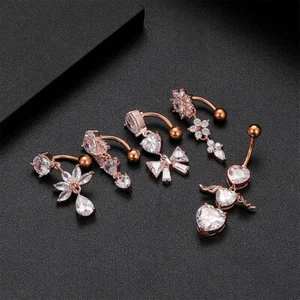 1 Pezzo Reverse Dangel Piercing Ombelico Cuore con Ali Fiore Anello Ombelico - Foto 1 di 19