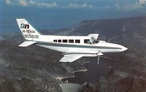 Air Nevada Cessna 402C II Airplane in flight - Picture 1 of 2