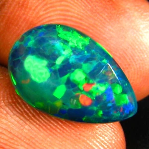 4.63 ct Phenomenal Pear Cabochon (15 x 10 mm) Ethiopian Flashing Black Opal - Picture 1 of 2