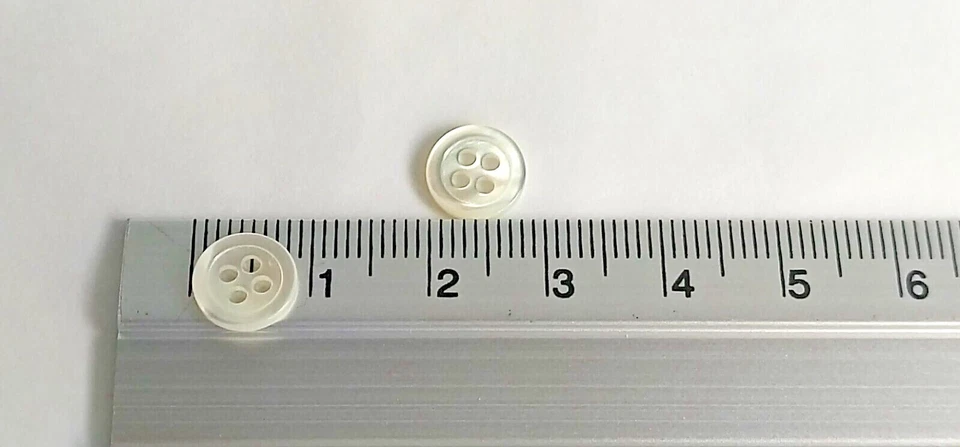 Shell  Button 9 mm.5/16",14L) 4 Hole Classic Rim Rainbow White,Black,Brown Shirt - Image 1 of 1