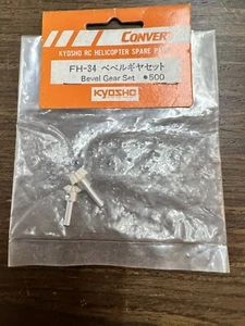 Nuevo en caja engranajes biselados de helicóptero de radiocontrol vintage Kyosho FH34 - Imagen 1 de 1