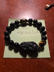 Schwarzes Buddha Stretch Armband - Bild 1 von 4