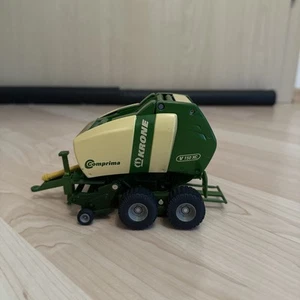 SIKU 2460 / Krone Rundballenpresse Comprima V150 XC / 1:32 Metall - Bild 1 von 4
