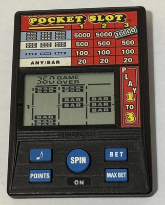 Juego de máquina tragamonedas portátil vintage RADICA 10000 Pocket Slot - Modelo 1370 funciona Foto 1 de 2