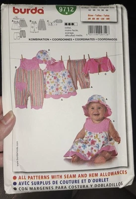 Burda 9712 Infant Dress Pants Rompers Top Hat Sewing Pattern 3-18 Mo Cut-altoget - Image 1 of 2
