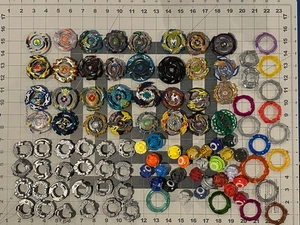 Riesiges Beyblade Set - 2 Stadien, Hunderte Burst/Metal Fusion Beyblades! - a6ii - Bild 1 von 9