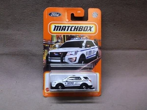 MATCHBOX 2022 #95 WHITE 2016 FORD INTERCEPTOR UTILITY NYPD POLICE PATROL VEHICLE - Picture 1 of 3