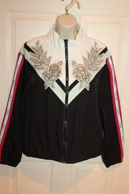 Chaqueta cortavientos Victoria’s Secret rosa negra plateada lentejuelas a rayas talla M Foto 1 de 4