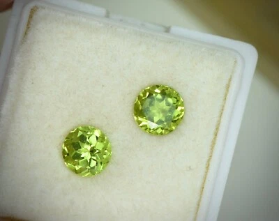 nice pair peridot rounds 1.96total carats - Image 1 of 3