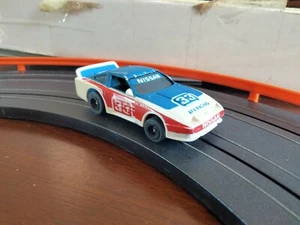 Vintage Aurora Tomy AFX HO SCALE SLOT CAR #33 NISSAN WORKING - Picture 1 of 6