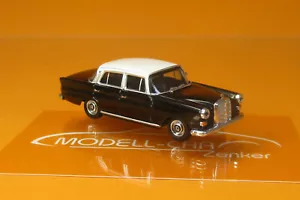 Herpa 430739-002 MB 200 Heckflosse (W110 Bj 1965) schwarz / weiß 1:87 NEU Modell - Bild 1 von 3