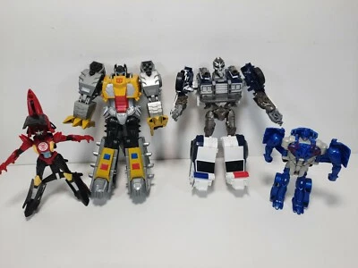 Transformers Lot Of 4 Grim Lock, Barricade, Wing Blade, Optimus Prime L@@K - Image 1 of 4