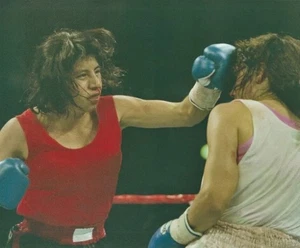 LAURA SERRANO vs. CHRISTY MARTIN 10x8 ACTION FIGHT PHOTOGRAPH MGM GRAND 5-7-94 - Picture 1 of 2