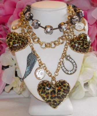 BETSEY JOHNSON LEOPARD LUCITE MULTICHARM HEARTS AND WINGS STATEMENT NECKLACE - Image 1 of 4