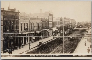 Vintage 1910s SHELDON, Iowa RPPC Photo Postcard "THIRD AVENUE LOOKING NORTH" - Picture 1 of 2