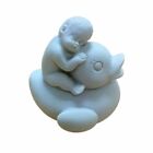 White Resin Baby On A Duck Figurine
