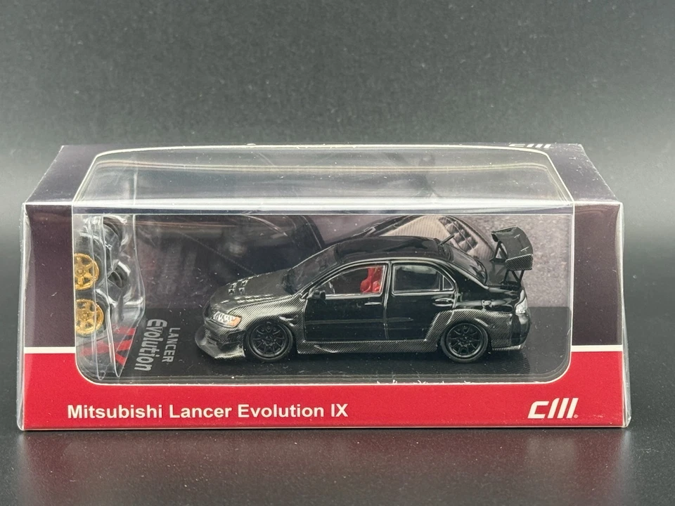 Modello CM Mitsubishi Lancer Evolution IX Carbonio Nero 1/64 - Immagine 1 di 1