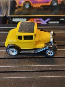 AFX '30 Ford Model A Coupe Slot Car, Yellow/ Black Roof w/ Early Style Chassis - Picture 1 of 3