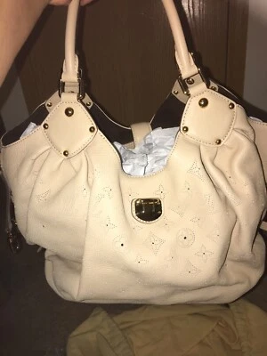 AUTÉNTICO LOUIS VUITTON MAHINA L M93503 IMPECABLE NUEVO Foto 1 de 4