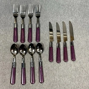 Juego de cubiertos de acero inoxidable con mango de plástico púrpura PIER 1 ONE de colección 12 piezas - Imagen 1 de 11