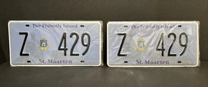 COPPIA TARGHE ST. MAARTEN 2014 L'ISOLA AMICA - Z 429 - COME NUOVE NOS!! - Foto 1 di 24