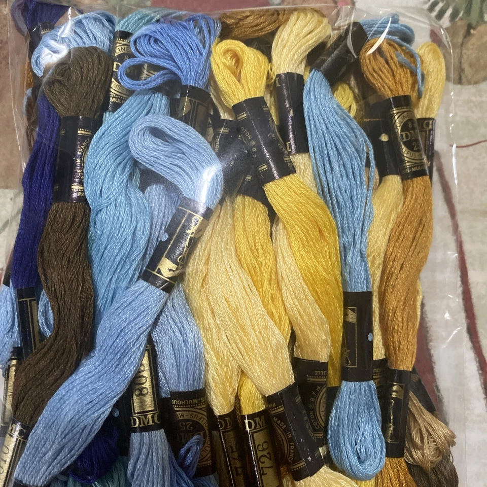 DMC Floss Lot of 50 Embroidery Skeins Blues, Yellows, Tan, Browns, Creams - Image 1 of 2