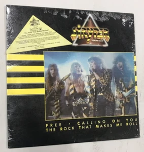 Stryper 12" Vinyl Single Free/Calling On You/The Rock That Makes Me Roll-SHRINK - Picture 1 of 6