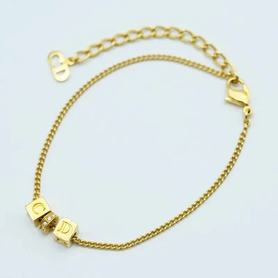 Christian Dior Cubo Dije CD Logo Estrás Cadena Pulsera Dorado Buen Estado Foto 1 de 4