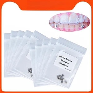 100 piezas botones de metal de ortodoncia dental hebilla de botón lingual base redonda adhesiva - Imagen 1 de 8