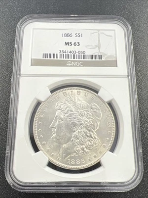 Dólar de plata Morgan 1886 $1 - NGC MS 63 / .9 / ¡Hermosa moneda! - ¡Sin precio base! Foto 1 de 4