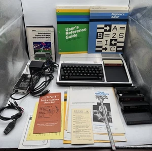 Texas Instruments TI-99/4A Home Computer scatola e manuali originali GIOCHI non testati - Foto 1 di 24