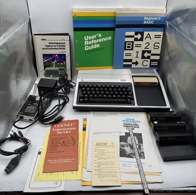 Texas Instruments TI-99/4A Heimcomputer OVP & Handbücher SPIELE FÜR TEILE - Bild 1 von 4