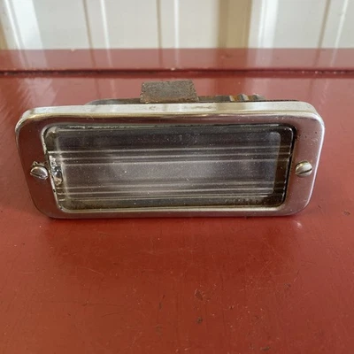 Oldsmobile 1942 luz de estacionamiento original Foto 1 de 4