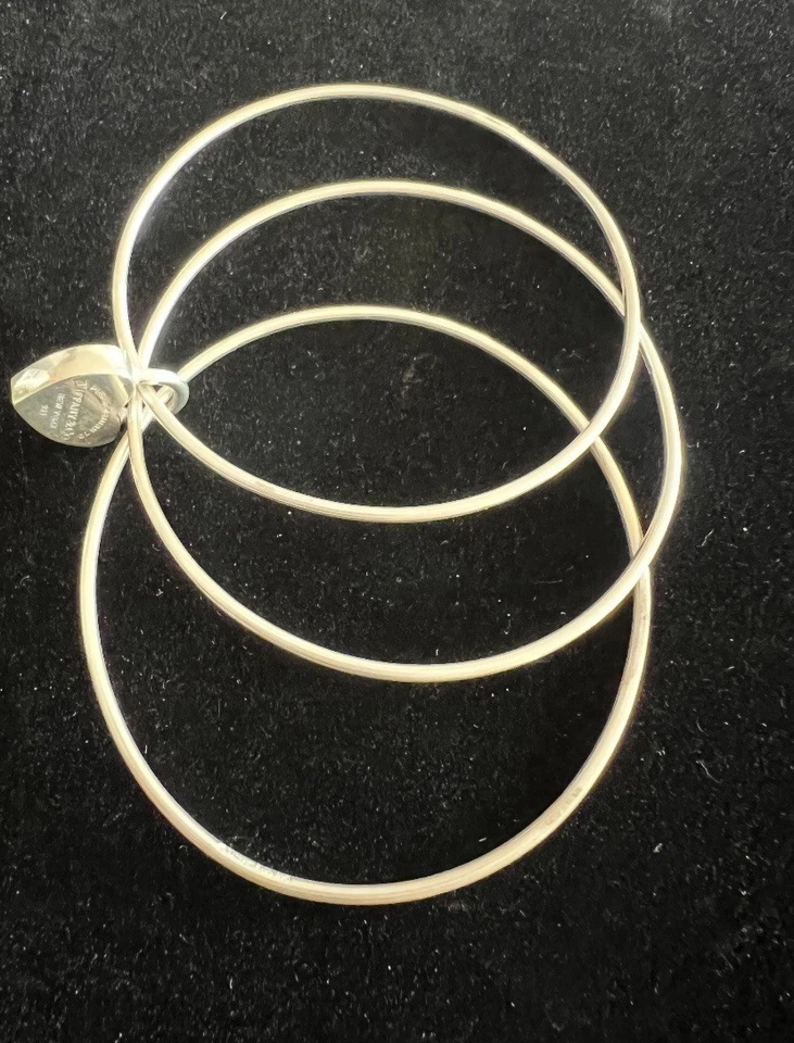 TIFFANY AND COMPANY PLATA ESTERLINA TRES BRAZALETES PULSERAS CON CANDADO CORAZÓN Foto 1 de 4
