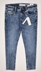 Calvin Klein Men's CKJ 026 SLIM Sits Below Waist Slim Leg