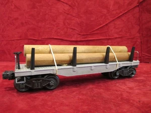 postwar LIONEL 2411 LOG OR PIPE CAR CAR  with log load & working trucks - Picture 1 of 11